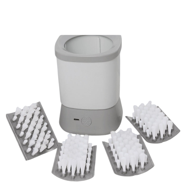 The Tailored Tail electric pet paw cleaner with white and grey ABS plastic cup and four detachable soft bristle brushes.