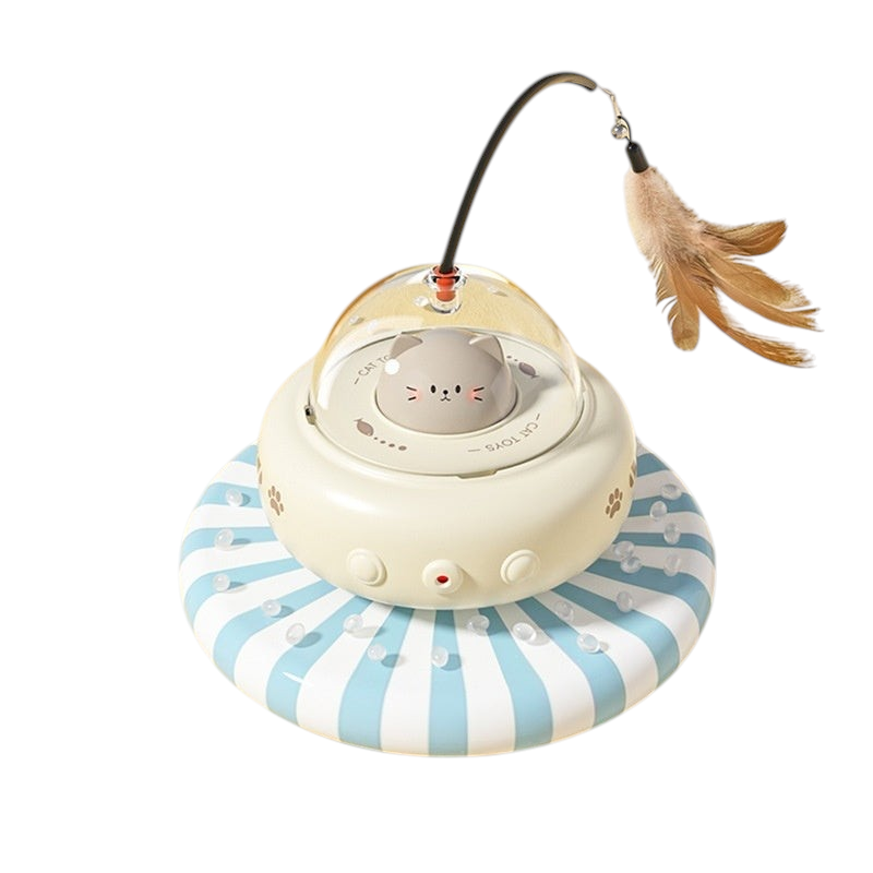 The Tailored Tail electric UFO cat toy with a rotating feather wand, bell, and cute cat figure in a cream base.