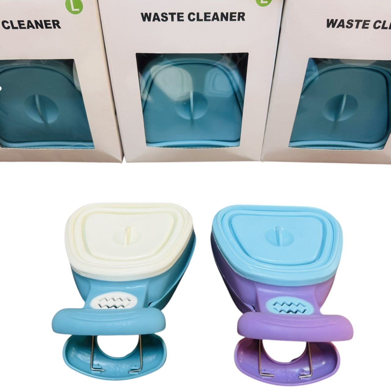 The Tailored Tail foldable dog poop scoopers in white and blue, made from durable PP and TPR for hygienic waste pickup.