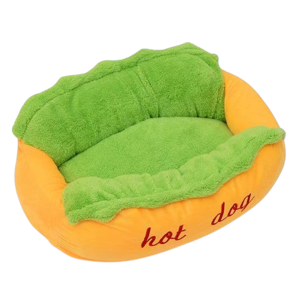The Tailored Tail plush hot dog pet bed for small dogs and cats with a vibrant orange exterior and soft green interior.