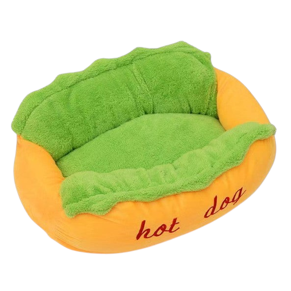 The Tailored Tail plush hot dog pet bed for small dogs and cats with a vibrant orange exterior and soft green interior.