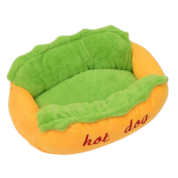 The Tailored Tail plush hot dog pet bed for small dogs and cats with a vibrant orange exterior and soft green interior
