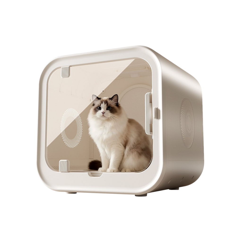 The Tailored Tail silent pet drying box with a fluffy cat inside, featuring a sleek white design and clear door.