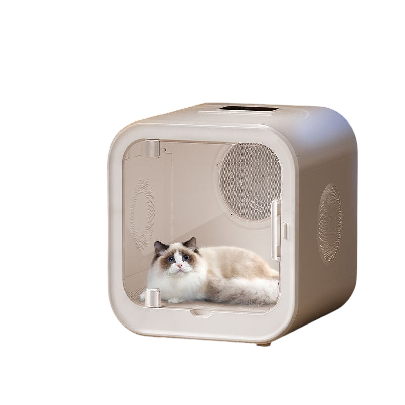 The Tailored Tail silent pet drying box with a cat inside, featuring low noise and efficient drying technology.